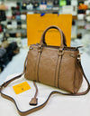 Louis Vuitton Leather 'LV' Embossed Handbag