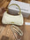 Le Bisou Mousqueton Bags