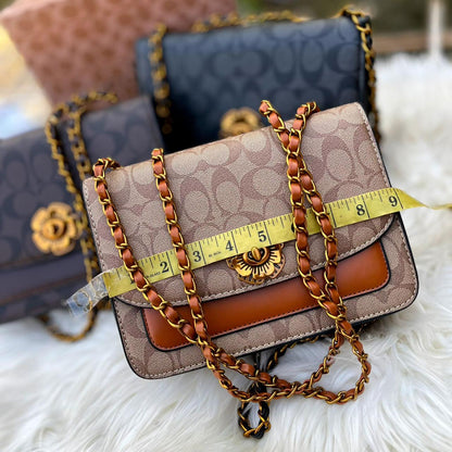 Coach Sleek Cross Body Bags
