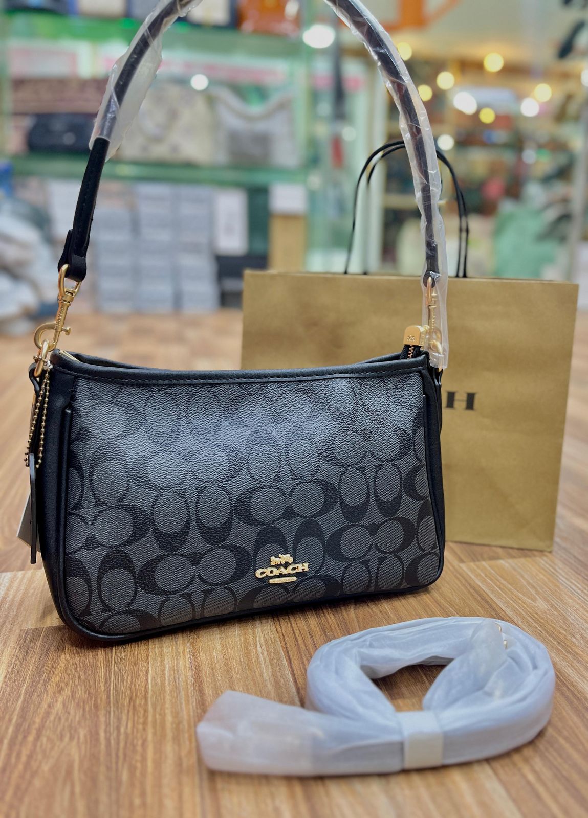 Coach Coated Leather Accents Hobo Bags