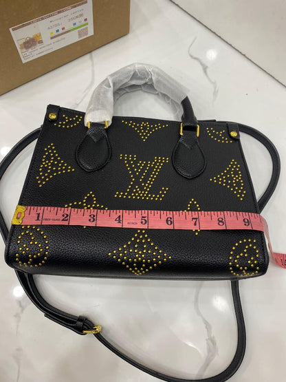 Lv On The Go Monogram Empreinte Bag