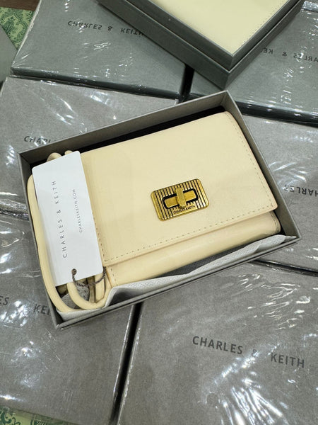 Charles and Keith Edna Turn-Lock Knotted-Strap Wallet