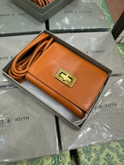 Charles and Keith Edna Turn-Lock Knotted-Strap Wallet