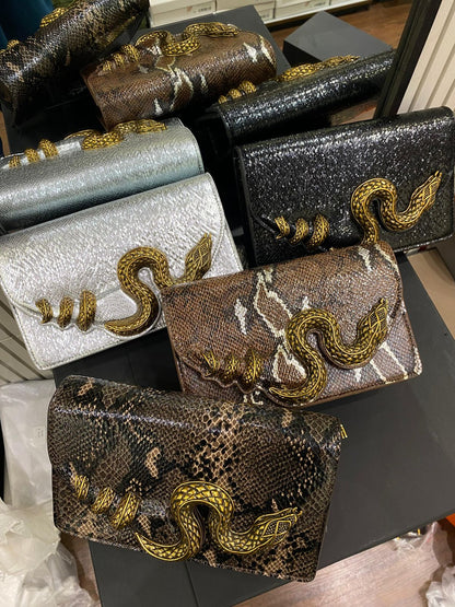 Chanel Quilted Mini Top Handle Flap Bag