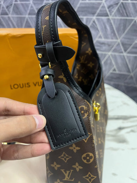 Louis Vuitton The Drop PM Bag