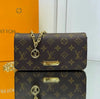 Louis Vuitton Monogram Lilly WOC Clutch Bag