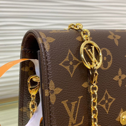 Louis Vuitton Monogram Lilly WOC Clutch Bag