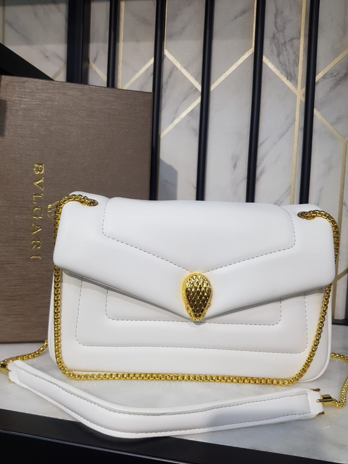 Bvlgari flap bag best sale